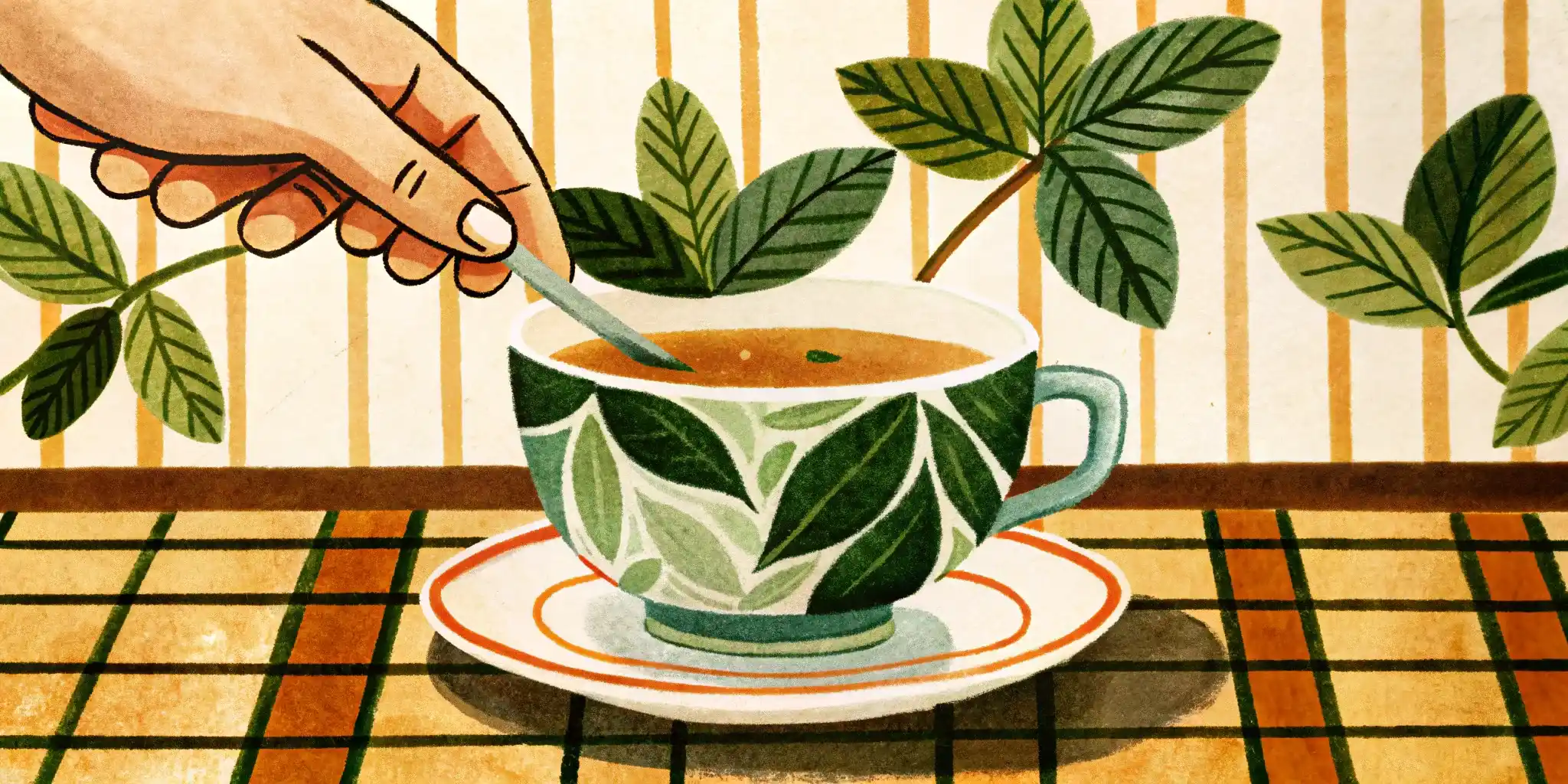 the hand puts a mint leaf in the tea cup